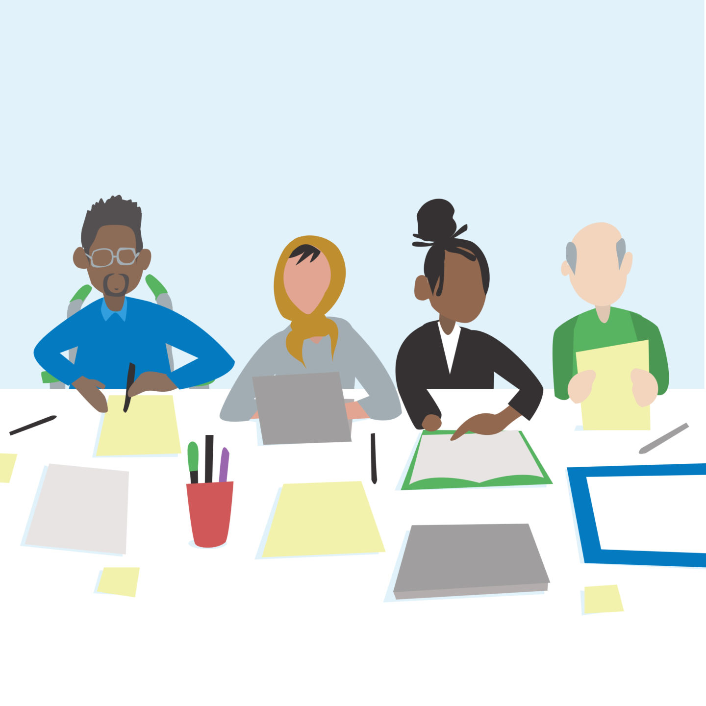 Inclusive Culture: a group of diverse people in an office setting working on a project